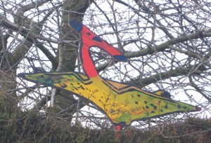 A Pterosaur with its colourful neck and head crest.