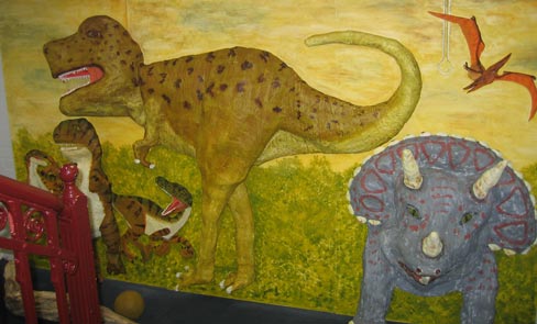 A dinosaur wall mural.