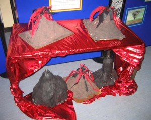 Volcano models on display.