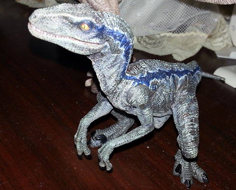 Customising a model dinosaur.
