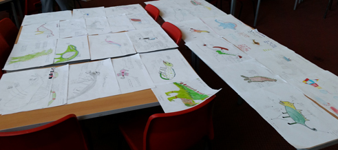 Colourful dinosaur designs by Year 6.