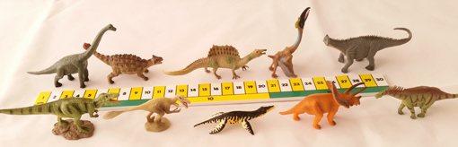 A1102 a box set of prehistoric animal models.