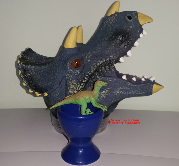 Triceratops head and a dinosaur model.