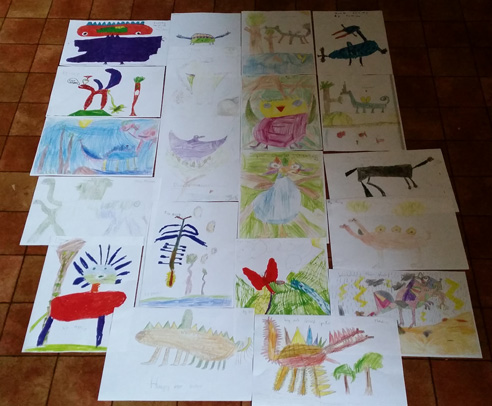 Schoolchildren send in dinosaur drawings.
