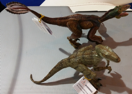 Two Papo Velociraptor models are compared.