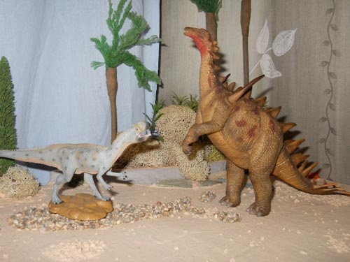 Metriacanthosaurus and Dacentrurus fight it out.