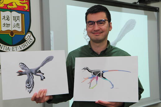 Dr Pittman with a body Plan and drawing of Anchiornis.