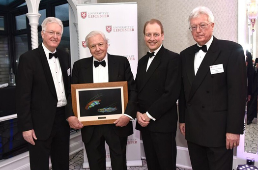 Sir David Attenborough receiving a copy of the high resolution image of Cascolus ravitis