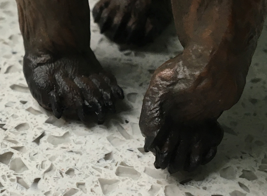 The huge paws of the Papo Cave Bear model.