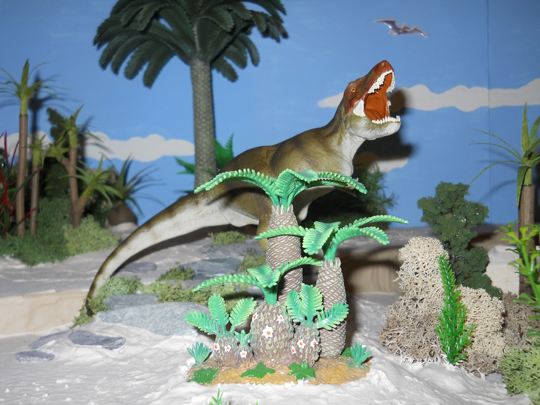T. rex lurks behind some prehistoric plants.