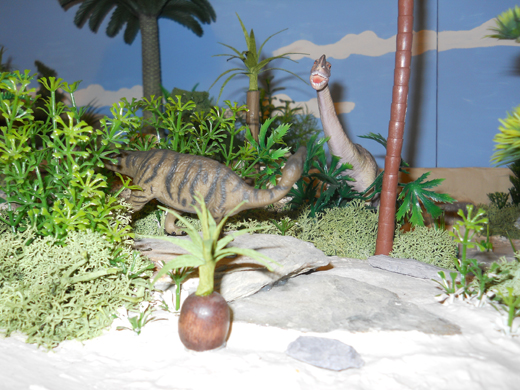A CollectA Camptosaurus and a Bullyland Europasaurus dinosaur model.