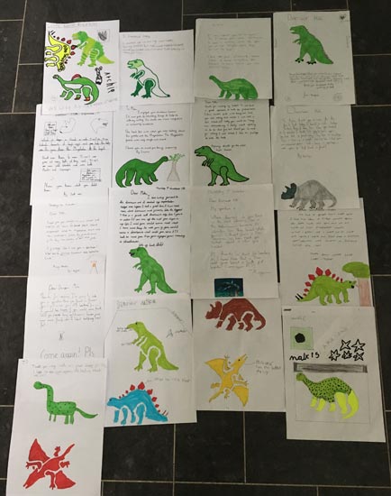 Prehistoric animal themed letters.