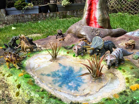 A small pond in the dinosaur diorama.