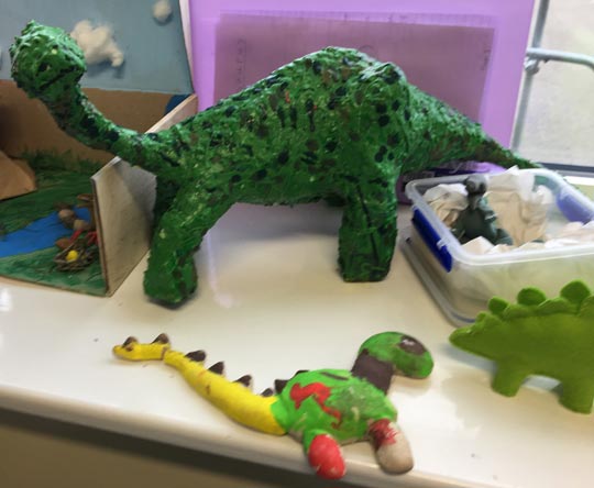 Models of dinosaurs by Year 2 children.