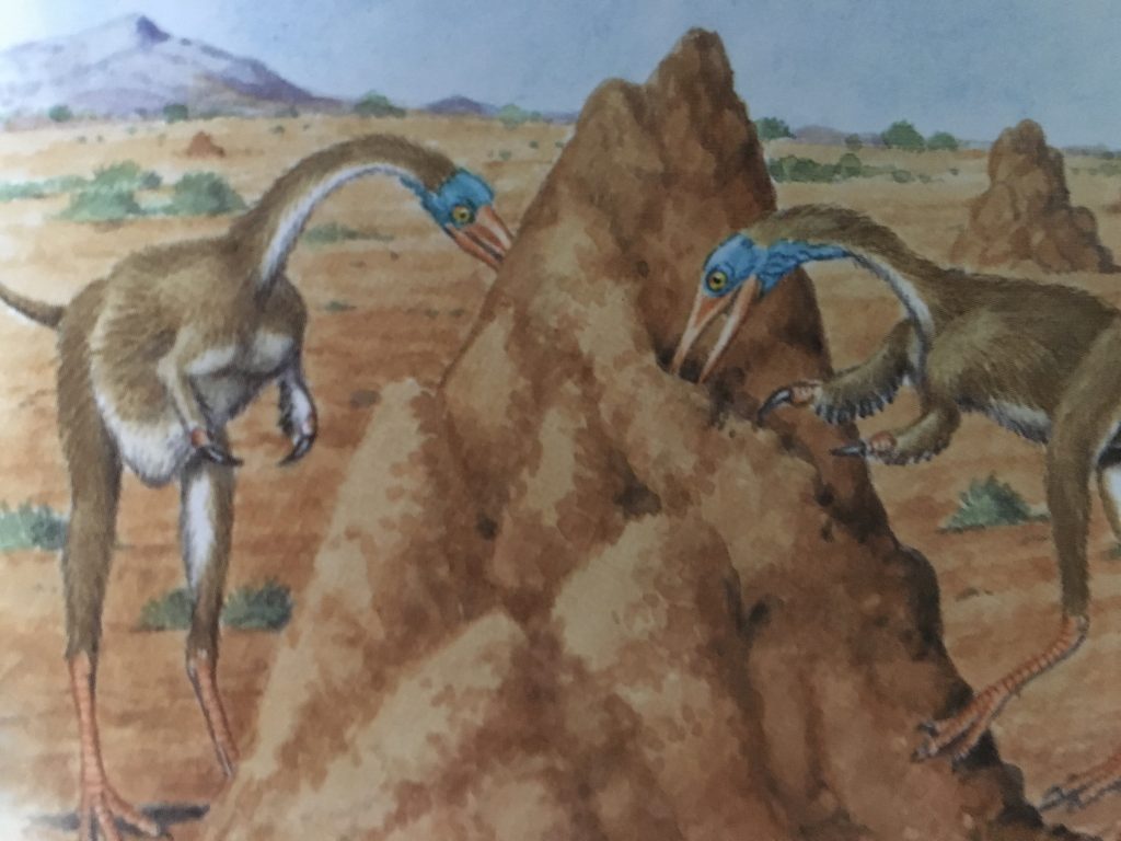 Alvarezsaurids breaking into a termite mound.