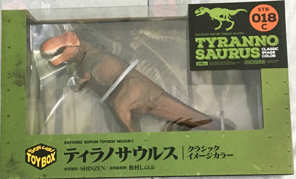 The Kaiyodo Sofubi Toy Box T. rex figure comes in a presentation box.