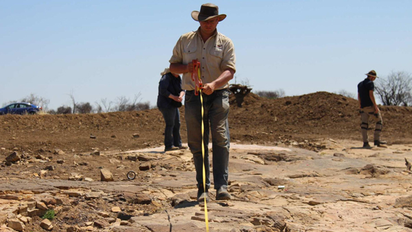 Mapping and measuring a dinosaur tracksite.