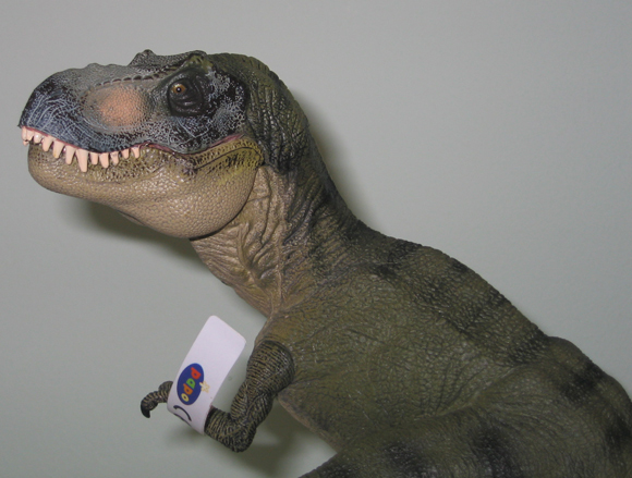 The Papo green standing T. rex dinosaur model.