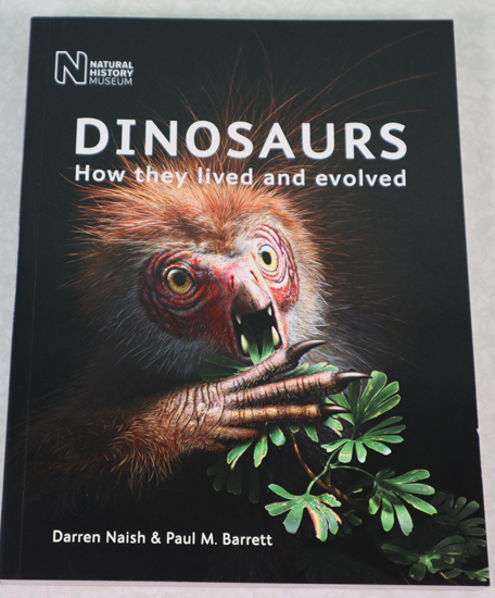 The front cover of the dinosaur book.
