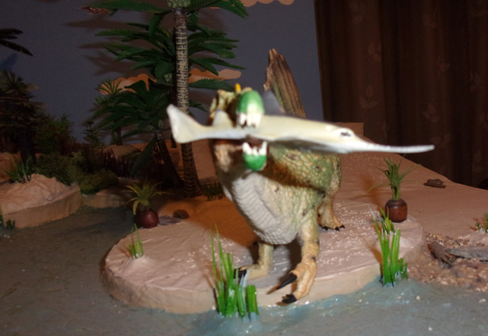 Spinosaurus feeding on an Onchopristis.