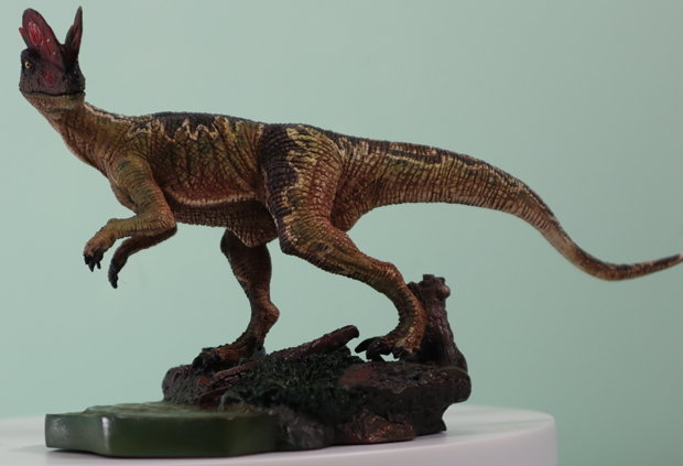 ITOY Studio Dilophosaurus dinosaur model with articulated jaw.