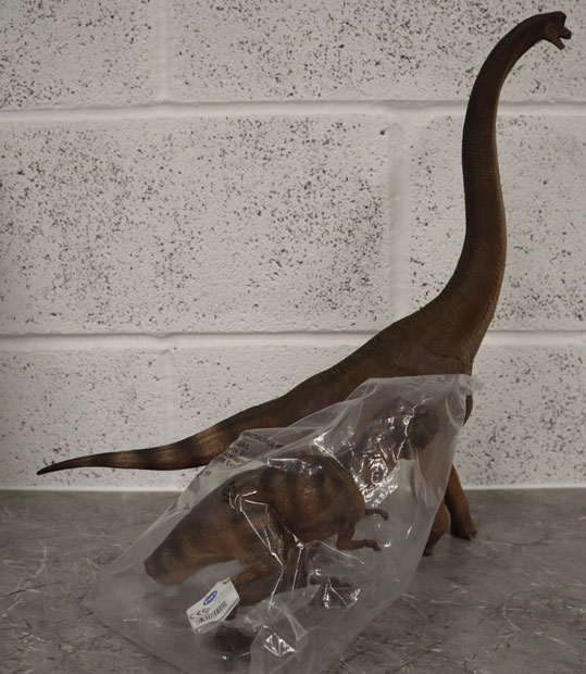Comparing the W-Dragon Giraffatitan to the Papo standing T. rex dinosaur model.