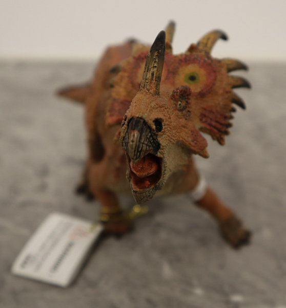 Papo red Styracosaurus (anterior view).