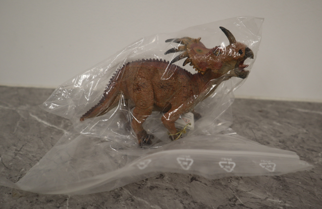 Papo red Styracosaurus in its plastic bag.