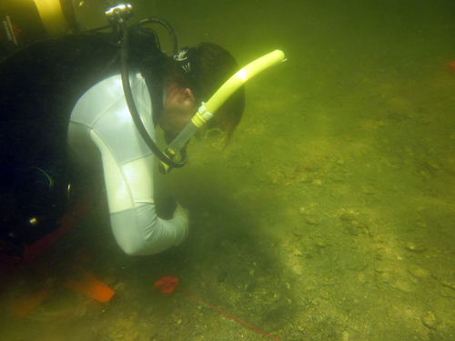 Exploring an underwater "midden heap".