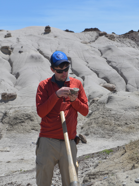 Co-author Andrew Flynn studying samples.